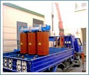 Фотография перевозки трансформатора в грузовой платформе манипулятора.
