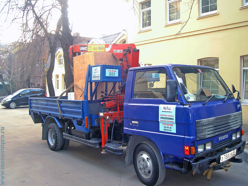 Перевозка печатного станка весом 340 кг мини манипулятором улица Волхонка.