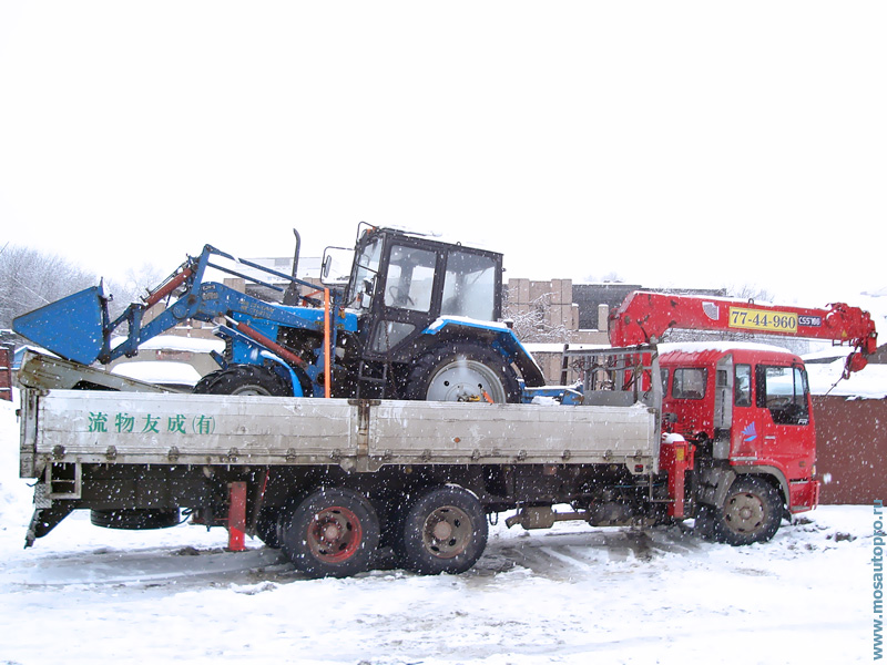 Эвакуация трактора Беларусь манипулятором, аренда манипуляторов для эвакуации с полной погрузкой.