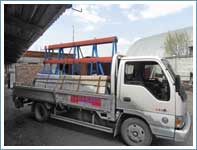 Перевозка распашных дверей высотой более 3 метров грузовиком с гидробортом.