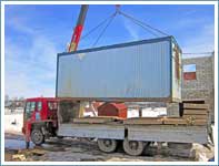 Перевозка строительной бытовки и плит ЖБИ весом 7 тонн манипулятором.
